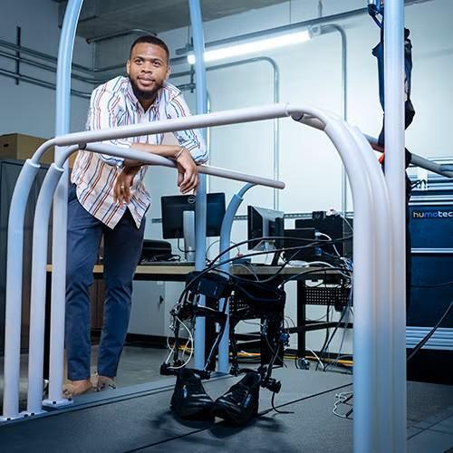 Dr. Quentin Sanders with exoskeleton